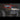 Shadowy photo of a red 4Runner with a C4 Hybrid bumper still in the raw metal finish that all C4 bumpers and armor ship in.