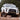 White 2014 4Runner offroading in mud and equipped with the Lo-Pro winch bumper manufactured by C4 Fabrication.
