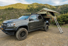 Load image into Gallery viewer, Vagabond Lite Rooftop Tent in Forest Green Hyper Orange on a Chevy Colorado Truck
